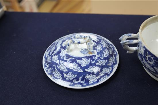 A Chinese blue and white bowl and cover, wood stand